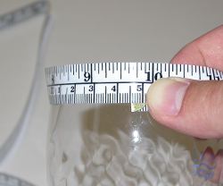 [The circumference of the glass is slightly greater than 9.5 inches]